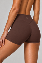 NVS Espresso Brown shorts on model in studio shot