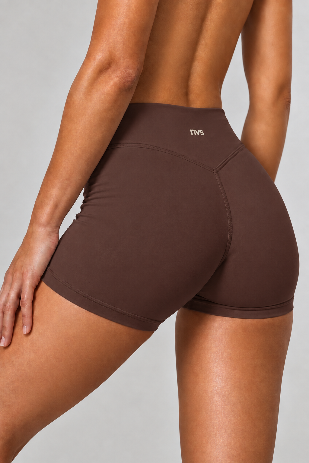 NVS Espresso Brown shorts on model in studio shot