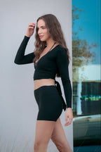 NVS black shorts lifestyle image side walking view