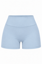 Light blue high-waisted athletic shorts with a wide waistband, shown against a plain white background.